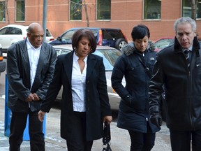 Junior Manon's family arrives at a coroner's inquest into his death. (ALEX CONSIGLIO/Toronto Sun)