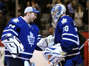 Maple Leafs goaltender James Reimer congratulates teammate Jonas Gustavsson after a win against the Lightning at the Air Canad Centre in Toronto, Ont., Jan. 3, 2012. (MIKE CASSESE/Reuters)