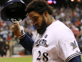 Free agent first baseman Prince Fielder is likely waiting on the Rangers to see if they sign Japanese pitcher Yu Darvish. (REUTERS/Jeff Haynes/Files)