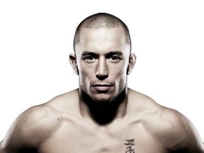 Georges St. Pierre (above) says he's rooting for Nick Diaz in his UFC 143 bout with Carlos Condit. (CHRIS DOUCETTE/Toronto Sun)