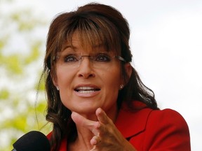 Former Alaska Governor Sarah Palin speaks at a Tea Party Express rally in Manchester, New Hampshire September 5, 2011.  (REUTERS/Brian Snyder)