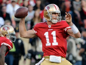 ﻿﻿San Francisco 49ers quarterback Alex Smith fires a pass during his club's huge win over the New Orleans Saints last weekend. (GETTY IMAGES)