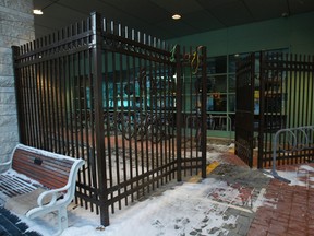 The new bike parking cage at Ottawa City Hall cost more than $8,000 more than the city's quoted price of $48,000, the Sun has learned. Tony Caldwell/Ottawa Sun/QMI Agency