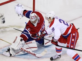 Canadiens goaltender Carey Price stops a shot by Capitals forward Alexander Semin at the Bell Centre in Montreal, Que., Jan. 18, 2012. (CHRISTINNE MUSCHI/Reuters)