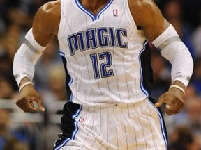 Orlando Magic's Dwight Howard plays against Miami Heat during the first half of their NBA basketball game in Orlando December 21, 2011.    (REUTERS/Kevin Kolczynski)
