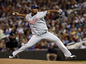 Indians starter Fausto Carmona -- or is it Roberto Hernandez? -- pitches against the Twins at Target Field in Minneapolis, Minn., Sep. 21, 2010. (ERIC MILLER/Reuters)