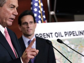 U.S. House Speaker John Boehner (R-OH) (L) gestures next to House Majority Leader Eric Cantor (R-VA) during the GOP news conference about the Keystone XL pipeline decision on Capitol Hill in Washington January 18, 2012. Boehner said on Wednesday Republicans in Congress will continue to fight for the Keystone XL crude oil pipeline that the Obama administration rejected. REUTERS/Yuri Gripas