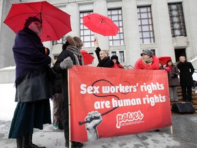 Supporters rallied in support of sex trade workers outside the  Supreme Court of Canada, January 19, 2012, in Ottawa. Ladies of the night from multiple cities converged on Ottawa, asking for the right to challenge Canada's prostitution laws. (JOHN MAJOR/QMI AGENCY)
