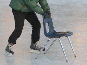 Dreamco Li from Gongdong, China braves the cold at the Forks while skating for the first time in Winnipeg Thursday January 19, 2012.
BRIAN DONOGH/WINNIPEG SUN/QMI AGENCY