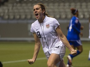 Heather O'Reilly of the U.S. celebrates her goal against the Dominican Republic during the first half of their CONCACAF Women's Olympic qualifying soccer game in Vancouver, B.C., Jan. 20, 2012.  (REUTERS/Andy Clark)
