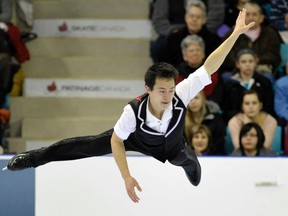 Patrick Chan flies through the air during the men’s short program at the Canadian Figure Skating Championships in Moncton, New Brunswick yesterday. (Mike Cassese /REUTERS)