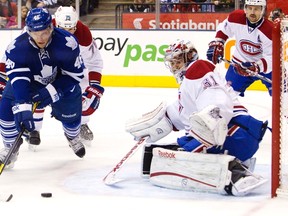 Montreal Canadiens goalie Carey Price (right) makes a save on Maple Leafs forward Joey Crabb in the second period on Saturday night at the Air Canada Centre. (Fred Thornhill/Reuters)