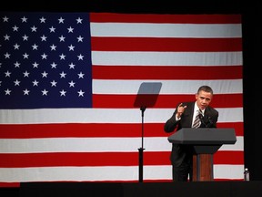 U.S. President Barack Obama speaks at a campaign fundraiser at the Apollo Theater in New York January 19, 2012. (REUTERS/Kevin Lamarque)
