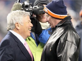 Robert Kraft (left), team owner of the New England Patriots and Pat Bowlen, team owner of the Denver Broncos, greet each other before last week's playoff game. (GETTY IMAGES)