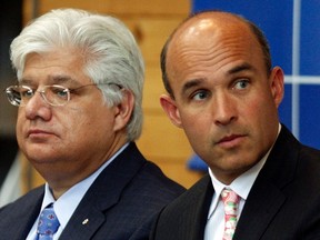 Former Research in Motion (RIM) co-CEOs Jim Balsillie (R) and Mike Lazaridis. (REUTERS/Mike Cassese/Files)
