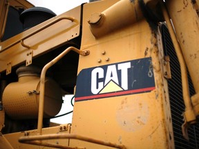 The logo on a piece of Caterpillar heavy equipment is pictured at a storage yard in Denver in this July 22, 2008 file photo. (REUTERS/Rick Wilking/Files)