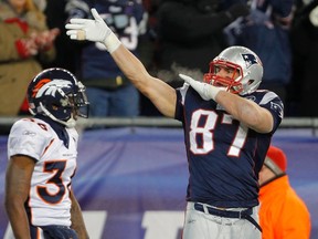 New England Patriots tight end Rob Gronkowski (right) celebrates. (REUTERS)