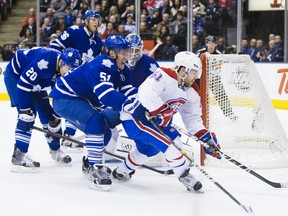 Toronto Maple Leafs Jake Gardiner  pursues Montreal Canadiens David Desharnais during the second period Saturday night at the ACC. Montreal won 3-1. (ERNEST DOROSZUK/Toronto Sun)