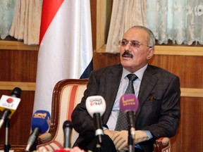 Yemen’s outgoing President Ali Abdullah Saleh speaks to a selected group of state media reporters at the Presidential Palace in Sanaa January 22, 2012. Saleh said on Sunday he would leave for medical treatment in the United States and return to continue leading the ruling party, but gave no indication of when he would leave the troubled country. REUTERS/Yemen’s Presidency/Handout