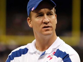 Peyton Manning is in an odd position, wanting to play the remainder of his career with the Colts but saying he's not ready for retirement if Indy doesn't bring him back. (REUTERS/Sean Gardner)