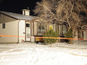 Four people are reported dead after a house fire in Winnipeg Jan. 24, 2012. The fire caused an estimated $100,000 in damage to the home. (STEPHEN RIPLEY/QMI Agency)