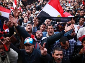 Demonstrators take part in a protest marking the first anniversary of Egypt's uprising at Tahrir square in Cairo January 25, 2012. (REUTERS/Suhaib Salem)