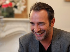 French actor Jean Dujardin speaks during an interview about the film "The Artist" in Paris January 24, 2012. (REUTERS/Philippe Wojazer)