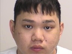 A Canada Wide Warrant has been issued for Stephen Duong, 27, (pictured) and Kien Ho, 27, in relation to a 2006 incident in which a group of armed and masked men entered a Toronto apartment, restrained those inside and stole property. Two suspects, Shun Wong, 26, and Paulo Stein, 26, both of Toronto, have been arrested and charged in the case.