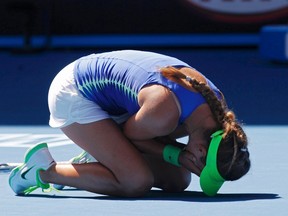 Victoria Azarenka celebrates after defeating Kim Clijsters in their Australian Open semifinal match in Melbourne, Australia, Jan. 26, 2012. (MARK BLINCH/Reuters)