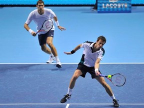 Max Mirnyi (left) and partner Daniel Nestor of Canada lost their doubles semifinal match at the Australian Open on Thursday, Jan. 26, 2012. (REUTERS/Toby Melville/Files)