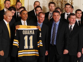 The Stanley Cup champion Boston Bruins visited the White House Monday, minus goalie Tim Thomas. (REUTERS)