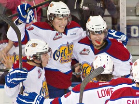 The Oil Kings celebrate a goal in Wednesday's game against the Tri-City Americans and, despite the loss, took heart in the fact that they were able to take the Western powerhouse squad to overtime. (Amber Bracken, Edmonton Sun)