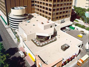 An aerial view of downtown's CityPlace mall, with a cylindrical parkade seen at the mall's left.