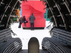 The University of Manitoba's new warming hut, known as HOTHUT, as seen through Fir Hut, one of the 2010 entries in The Forks architectural competition. Five new entries will grace the river trail this year, along with remaining ones from previous years. (PAUL TURENNE/Winnipeg Sun)