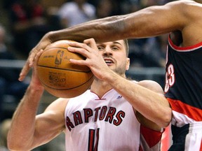 Toronto Raptors' Linas Kleiza drives to the basket past Portland Trail Blazers Craig Smith in a recent game at the ACC. (REUTERS)