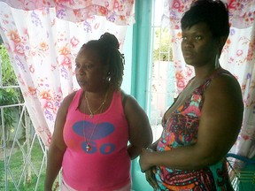 Patricia Smith-Bell, left, and her sister, Namishay Clarke. Both live on the same street as Stephanie and Alphonso Warren did. both say that the couple moved to Jamaica to avoid having Joshua taken away by child services in Canada. (Supplied photo)