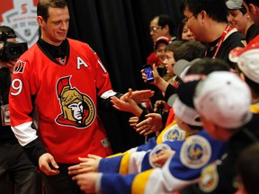 Jason Spezza, who greeted fans on Friday, has his fingers crossed that Daniel Alfredsson returns for at least one more season. (DARREN BROWN, OTTAWA SUN)