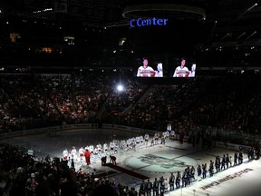 Team Staal and Team Lidstrom line up for the Canadian and United States national anthems prior to in the 58th NHL All-Star Game at RBC Center on January 30, 2011 in Raleigh, North Carolina. (Harry How/Getty Images/AFP)