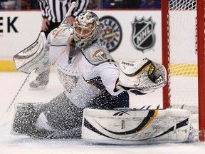 Predators goaltender Pekka Rinne makes a glove save on the Canucks at Rogers Arena in Vancouver, B.C., May 7, 2011. (BEN NELMS/Reuters)