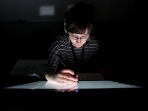 Digital artist Mandy Jacek draws on a digital tablet as she works on a video game, while taking part in the Startup Hackathon and Global Game Jam at the University of Alberta Jan. 28. More than 90 participants are taking part in the 54-hour coding and design marathon.  DAVID BLOOM EDMONTON SUN