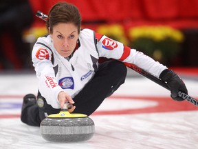 Skip Cheryl Bernard makes a shot as her team faced Team Sweeting during the Alberta Scotties Tournament of Hearts at the Leduc Recreation Centre on Saturday. Sweeting won, knocking Bernard's rink out of the national championship next month.