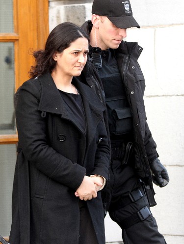 Tooba Mohammad Yayha leaves the Frontenac County Court house in Kingston on Sunday January 27  2012 after she was convicted of four counts of first degree murder. She along withher husband Mohammad Shafia  and their son Hamed were each convicted in the deaths of four other family members. (IAN MACALPINE KINGSTON/QMI AGENCY)