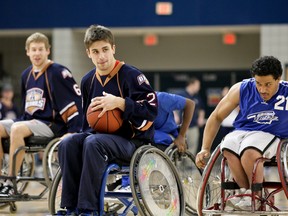 Members of the Oklahoma City Barons played a game of wheelchair basketball against the Oklahoma Blazers recently.
