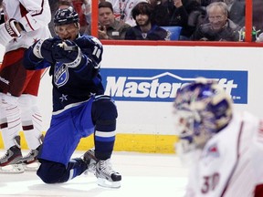 New York Rangers Marian Gaborik (L) of Team Chara celebrates after scoring on New York Rangers goalie Henrik Lundqvist of Team Alfredsson during the NHL All-Star hockey game in Ottawa January 29, 2012.   REUTERS/Blair Gable (CANADA - Tags: SPORT ICE HOCKEY)