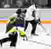 Boxing champion Jean Pascal looks to make a pass during a game against the U of A Ringette Team at West Edmonton Mall's Ice Palace, Sunday Jan. 29, 2012. The game was part of the Ringette Scores on Cancer fundraiser for the Cross Cancer Institute. DAVID BLOOM EDMONTON SUN  QMI AGENCY