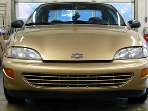 A file photo shows a gold Chevy Cavalier, which is similar to the suspect car.