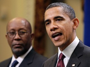 U.S. President Barack Obama speaks on the U.S.-South Korea trade agreement next to U.S. Trade Representative Ron Kirk in Washington in this December 4, 2010 file photo. A new team of U.S. trade enforcers will make countries think twice about putting up barriers to American exports, Obama's top trade official said. U.S. Trade Representative Ron Kirk told Reuters that the team, announced by Obama last week, will include intelligence officials as well as representatives of other government agencies in order to beef up stretched U.S. resources and crack open markets. To match Interview USA-TRADE/KIRK        REUTERS/Yuri Gripas/Files (UNITED STATES - Tags: POLITICS BUSINESS)