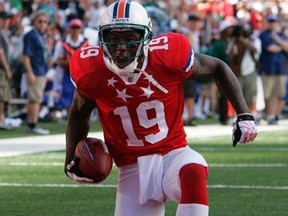 AFC wide receiver Brandon Marshall celebrates after scoring a touchdown against the NFC during the NFL Pro Bowl at Aloha Stadium in Honolulu, Hawaii Jan., 29, 2012. (HUGH GENTRY/Reuters)