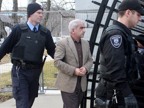 Mohammad Shafia arrives at the courthouse in Kingston on Sunday before he was convicted of four counts of first degree murder. IAN MACALPINE/QMI Agency)