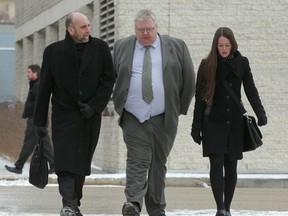 Mark Stobbe (middle) is accused of killing his wife Beverley Rowbotham at their home in St. Andrews in 2000. (JASON HALSTEAD/QMI AGENCY)